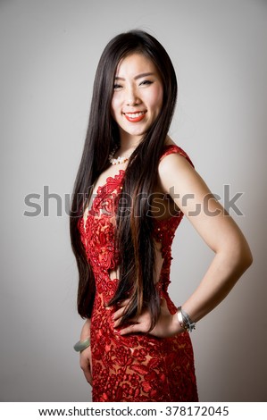 stock-photo-sexy-chinese-girl-with-long-black-hair-in-red-dress-on-grey-background-378172045 What Are the Qualities of an Most suitable Wife?