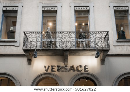 Milan, Italy - October 8, 2016: Window and entrance of a Versace shop in Milan - Montenapoleone area, Italy. Few days after Milan Fashion Week. Fall Winter 2017 Collection.