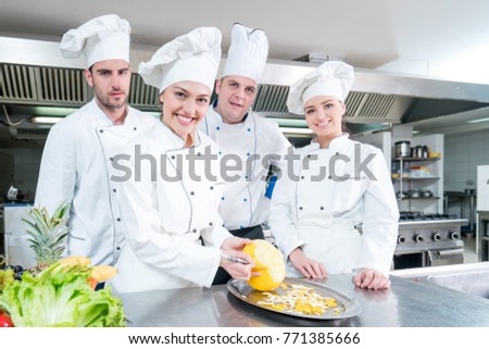 Chef and kitchen staff. Teamwork