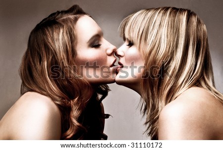 http://thumb9.shutterstock.com/display_pic_with_logo/163966/163966,1243529440,2/stock-photo-women-attraction-between-two-blond-female-kissing-31110172.jpg