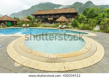 HOA BINH - VIETNAM MAY 29: Beautiful reflections at a resort pool in Hoa Binh province, Vietnam on May 29, 2016