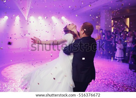 https://thumb9.shutterstock.com/display_pic_with_logo/164658092/516376672/stock-photo-happy-beautiful-newlyweds-dancing-in-the-restaurant-516376672.jpg