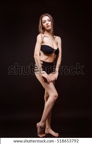 Tantalizing Ebony With Long Hair Stripteasing Seductively