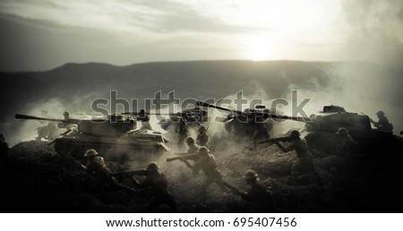 War Concept. Military silhouettes fighting scene on war fog sky background, World War Soldiers Silhouettes Below Cloudy Skyline At night. Attack scene. Armored vehicles. Tanks battle. Decoration
