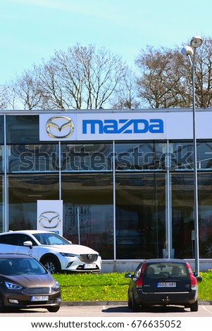 KLAIPEDA,LITHUANIA-MAY 12: MAZDA cars showroom and logo on May 12,2017 in Klaipeda,Lithuania.