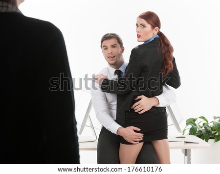 http://thumb9.shutterstock.com/display_pic_with_logo/1672675/176610176/stock-photo-handsome-young-man-hugging-woman-beautiful-couple-kissing-caught-by-surprise-176610176.jpg
