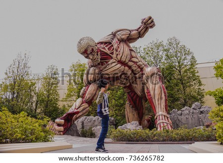 armored titan statue