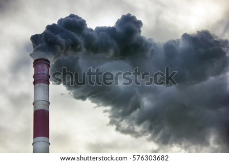 Air pollution, closeup of one big smoking pipe