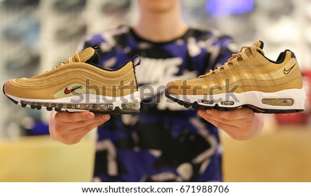 Nike store. Nike Air Max shoes in hands. Ukraine, Kiev - June 20, 2017