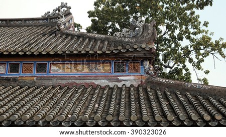 HUE, VIET NAM- FEB 19, 2016: Citadel, an culture heritage with Hoang Thanh (Imperial City),Tu Cam Thanh (Forbidden City), Dai Noi (Inner city), ngo mon (noon gate), detail of roof of ancient Vietnam