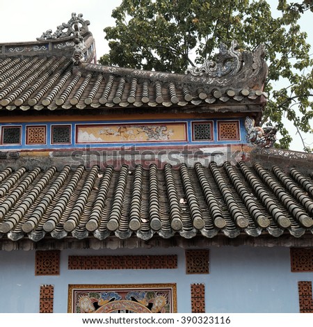 HUE, VIET NAM- FEB 19, 2016: Citadel, an culture heritage with Hoang Thanh (Imperial City),Tu Cam Thanh (Forbidden City), Dai Noi (Inner city), ngo mon (noon gate), detail of roof of ancient Vietnam