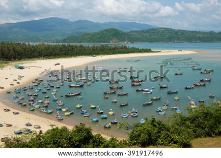 Amazing scene at fishing village in Phu Yen, Viet Nam, crowded of circle boat floating on water, valley of fishing boat at Vietnam channel, group of coracle in panoramic view, beautiful seascape