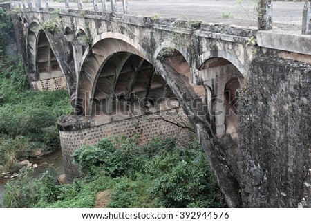 QUANG TRI, VIET NAM- FEB 23, 2016: Dau Mau bridge on Ho Chi Minh trail, an old bridge link with Vietnam war history make by French locate at Cam Lo, with amazing architect, pass green jungle