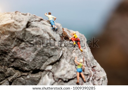 miniature mountain climber figures