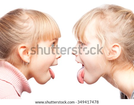 Stock Photo Two Little Girls Stick Out Tongues Teasing Each Other 349417478 