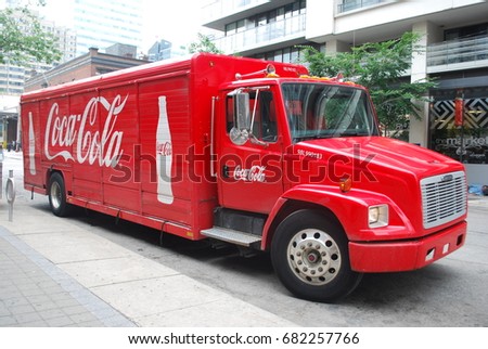 CocaCola Truck With Logos And Glass Bottle Image - Soft Drink / Pop - Vintage / Retro Red Vehicle - TORONTO, CANADA - July 2017