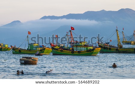 CIRCA APRIL 2010 - QUY NHON, VIETNAM - Fishing boats moored off the shore, on 25 April 2010, at Quy Nhon, Vietnam.
