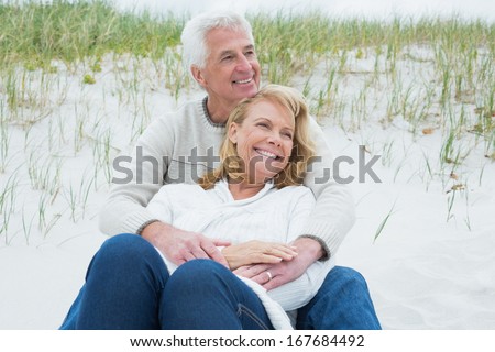 https://thumb9.shutterstock.com/display_pic_with_logo/1814639/167684492/stock-photo-romantic-senior-man-and-woman-relaxing-on-sand-at-the-beach-167684492.jpg