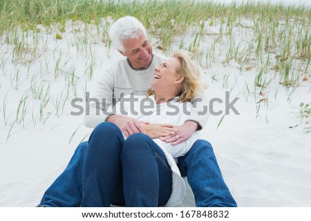 https://thumb9.shutterstock.com/display_pic_with_logo/1814639/167848832/stock-photo-romantic-senior-man-and-woman-relaxing-on-sand-at-the-beach-167848832.jpg