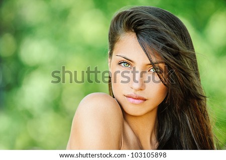 https://thumb9.shutterstock.com/display_pic_with_logo/186589/103105898/stock-photo-portrait-of-young-beautiful-woman-with-bare-shoulders-on-green-background-summer-nature-103105898.jpg