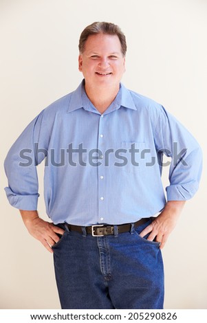 stock-photo-studio-portrait-of-smiling-overweight-man-205290826.jpg