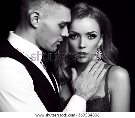 https://thumb9.shutterstock.com/display_pic_with_logo/1904156/369534806/stock-photo-fashion-black-and-white-studio-photo-of-beautiful-couple-in-elegant-clothes-gorgeous-woman-with-369534806.jpg