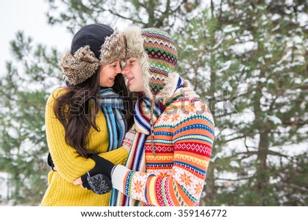 https://thumb9.shutterstock.com/display_pic_with_logo/1928840/359146772/stock-photo-a-couple-in-love-hugging-winter-park-girl-korean-asian-european-man-359146772.jpg