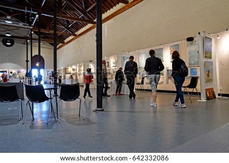 Le Croisic, France - april 12 2017 : exhibition in the old fish market