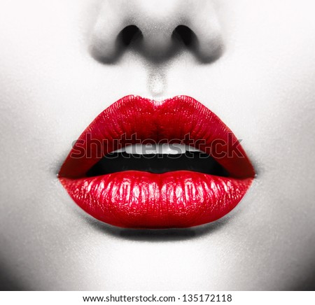 Sexy lips black and white conceptual image with vivid red open mouth makeup Sexy lips black and white conceptual image with vivid red open mouth makeup