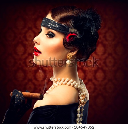 Retro Woman Portrait. Vintage Styled Girl With Cigar. Smoking Lady. Vintage Styled Photo. Old Fashioned Makeup and Finger Wave Hairstyle. 20's or 30's style.