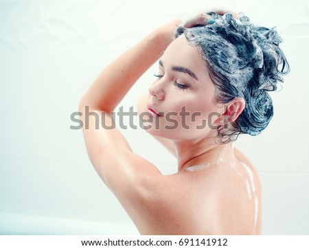 Beautiful Naked Young Woman Smiling While Taking Shower In 
