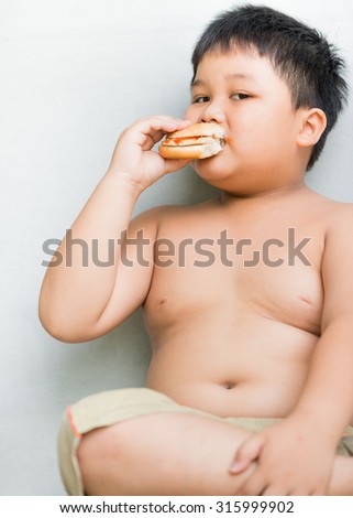 Calgary buffaloes midget aaa hockey club A chubby boy eating