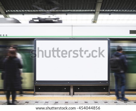 Blank Billboard Banner Light box in Subway station with blurred people Travel