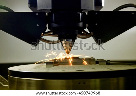 detail of 3d printer printing a metal piece