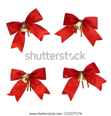 Christmas decorations - red ribbons and bells isolated on white background