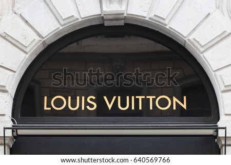 Lyon, France - February 26, 2017: Louis Vuitton sign on a wall. Louis Vuitton is a French company specialized in fashion accessories