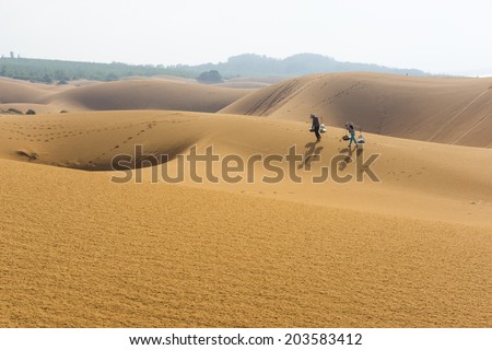 Vendor sell instant food on Mui Ne red sand hill in Binh Thuan, Vietnam. Binh Thuan has long seashore with a lot of beautiful beach and resort