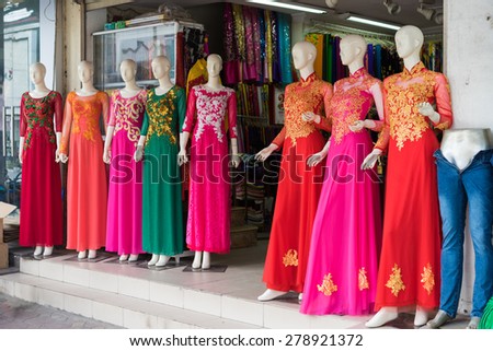Hanoi, Vietnam - Apr 28, 2015: Vietnamese traditional dress Ao Dai for sale in a shop in Xuan Thuy street