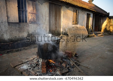 Big pot to cook Chung cake outdoor, square glutinous rice cake, Vietnamese lunar new year food