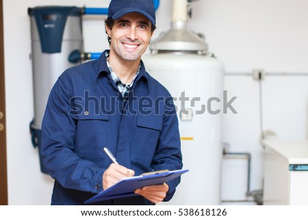 Technician servicing an hot-water heater