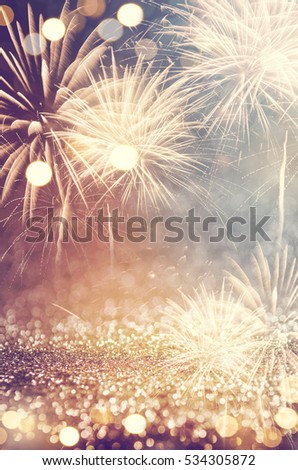 Vintage gold and green Fireworks and bokeh in New Year eve and copy space. Abstract background holiday.