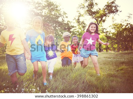 Children Outdoors Playing Cheerful Together Concept