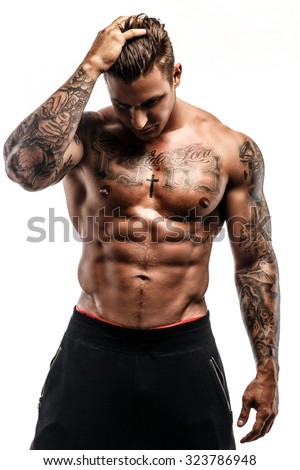 Shirtless Muscular Tattooed Man Isolated On Stock Photo 