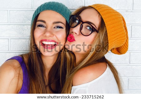 Close up fashion lifestyle portrait of two young hipster girls best friends, ... - stock-photo-close-up-fashion-lifestyle-portrait-of-two-young-hipster-girls-best-friends-wearing-bright-make-up-233715262