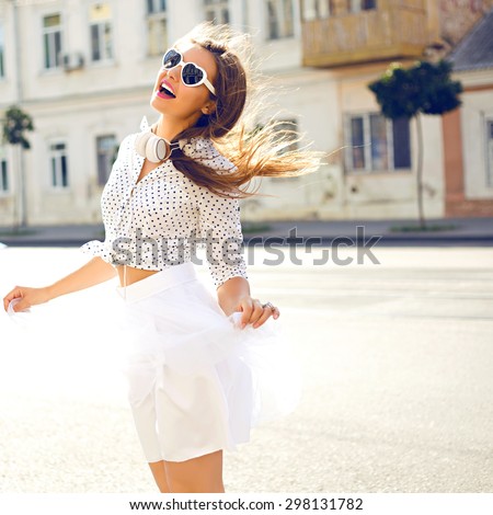 https://thumb9.shutterstock.com/display_pic_with_logo/2237975/298131782/stock-photo-outdoor-summer-lifestyle-image-of-young-pretty-hipster-woman-having-fun-listening-music-and-298131782.jpg