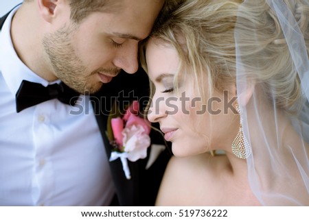 https://thumb9.shutterstock.com/display_pic_with_logo/2302709/519736222/stock-photo-wedding-couple-on-the-nature-is-hugging-each-other-beautiful-model-girl-in-white-dress-man-in-519736222.jpg