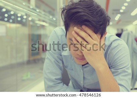 stock-photo-close-up-asian-man-acute-stress-with-his-work-job-employee-hand-gesture-palm-up-over-face-and-head-478546126.jpg