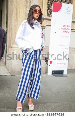 https://thumb9.shutterstock.com/display_pic_with_logo/2365163/385647436/stock-photo-milan-italy-february-fashionable-woman-before-luisa-beccaria-fashion-show-during-milan-women-385647436.jpg