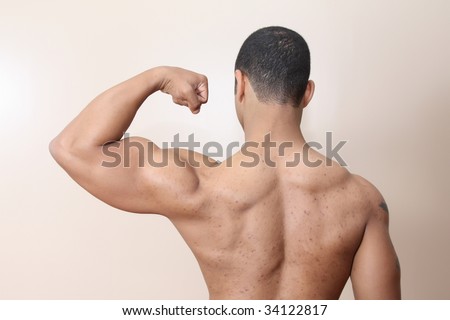 Young Male Flexing Back Arm Muscles Stock Photo 34122817 - Shutterstock