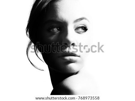 High contrast black and white portrait of a beautiful girl High contrast black and white portrait of a beautiful girl